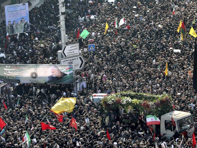 Mourners attend the funeral ceremony for Soleimani. Picture: AP