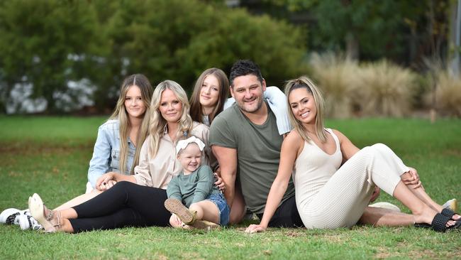 Alex Fevola with family. From left: Leni, 15, Alex, Tobi, 3, Lulu, 12, Brendan and Mia, 22. Picture: Nicki Connolly