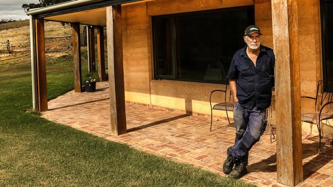 Malcolm Hackett at his bushfire-proof home in Strathewen. Picture: Julian Kingma