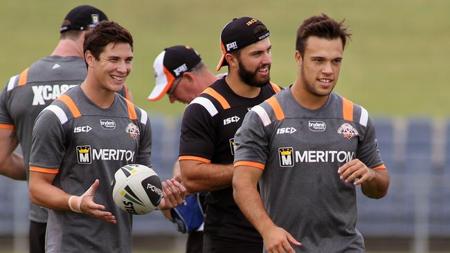 Mitchell Moses, James Tedesco and Luke Brooks during a Tigers training session. Picture: Jonathan Ng