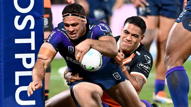 Dale Finucane scores against Wests Tigers in Round 15. (Photo by Bradley Kanaris/Getty Images)