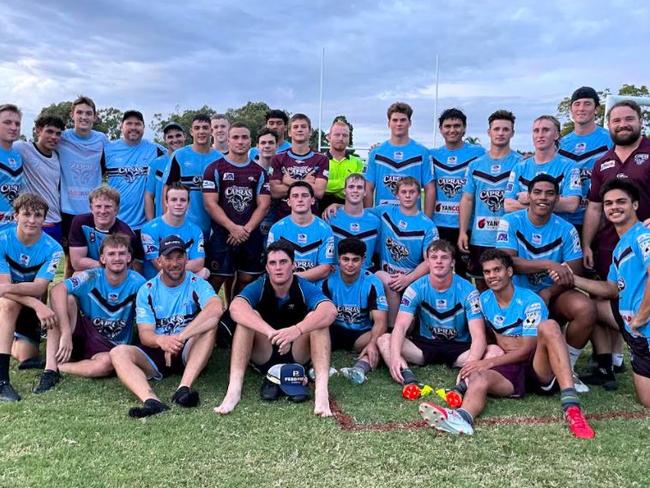 Coach Kane Hardy with the Capras under-18 squad, which has made a winning start to their 2021 season.