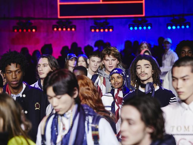 Jordan Barrett and Halima Aden among a sea of models backstage in London. Picture: Getty Images for Tommy Hilfiger