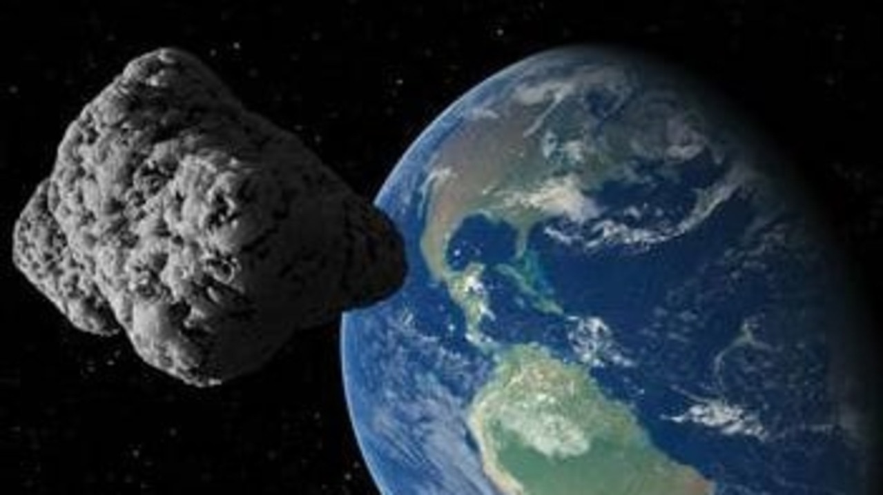 An artist’s impression of an asteroid zooming past Earth.