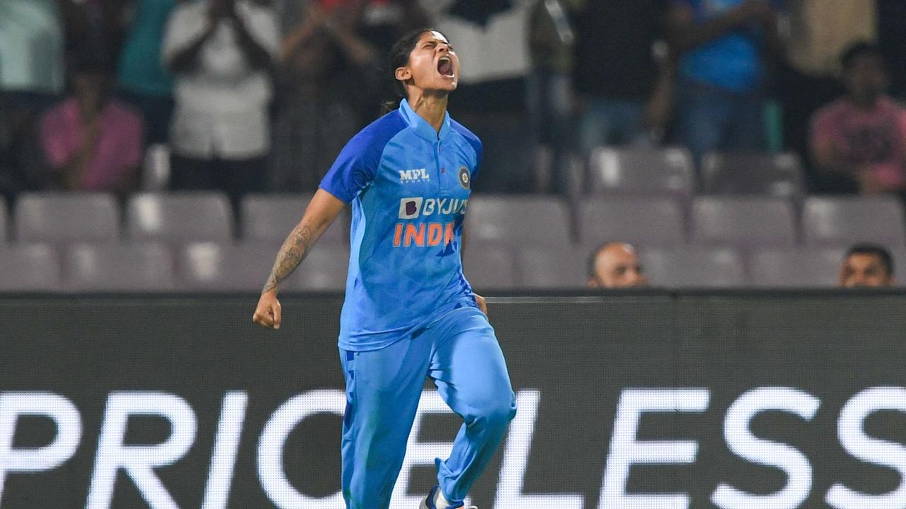 India's Yastika Bhatia celebrates after taking the wicket of Australia's Ashleigh Gardner during the super over. (Photo by INDRANIL MUKHERJEE / AFP)