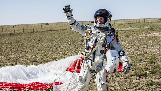 Felix Baumgartner celebrating after successfully completing the final manned flight for Red Bull Stratos in Roswell, New Mexico. Picture: AFP /redbullcontentpool.com/Balazs Gardi/HO