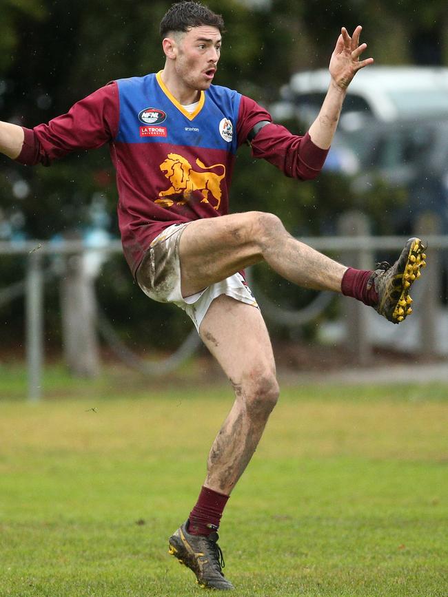 NFL: Reece Jones gets a kick for South Morang. Picture: Hamish Blair