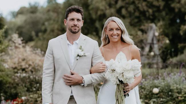 Travis Boak walked his sister Cassie Boak down the aisle on her wedding day. Picture: Captured by Georgie