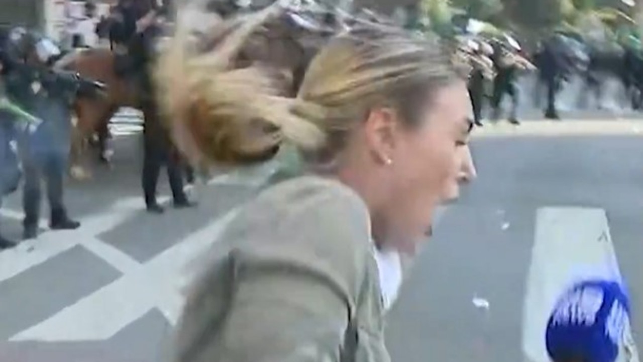 Projectile strikes Aussie journo in LA chaos | WATCH