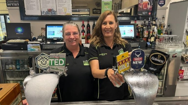 Stacey Dugmore (left) was glad her workplace didn’t suffer the flooding that damaged her home.