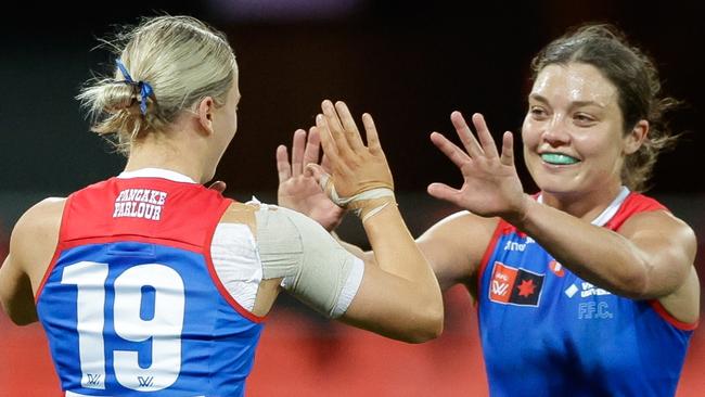 GOLD COAST, AUSTRALIA - AUG 17: Heidi Woodley of the Western Bulldogs celebrates a goal during the 2024 AFLW Practice Match between the Gold Coast SUNS and the Western Bulldogs at People First Stadium on August 17, 2024 in Gold Coast, Australia. (Photo by Russell Freeman/AFL Photos via Getty Images)