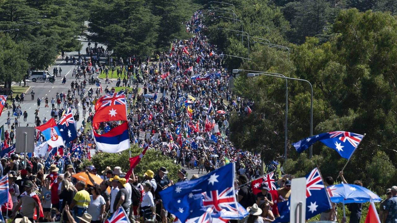 Demonstrators against Covid-19 mandates marching to Parliament House in Canberra. Picture: NCA NewsWire/Martin Ollman