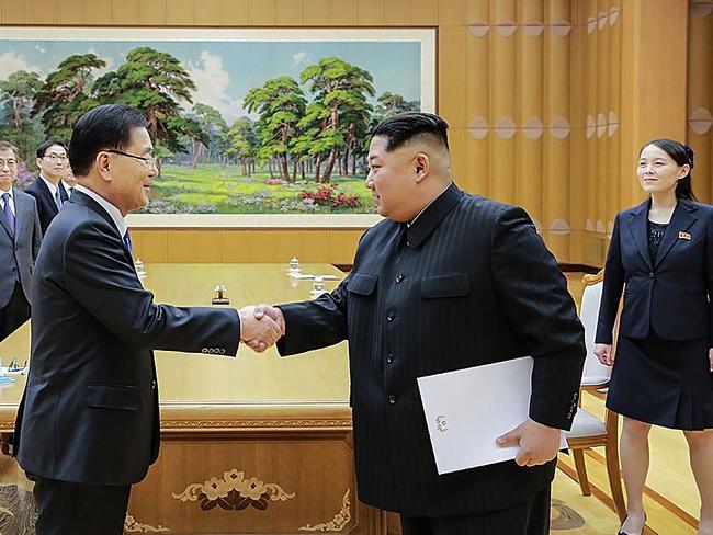 Chung Eui-Yong (left), head of the presidential National Security Office shakes hands with North Korean leader Kim Jong-un. Picture: South Korean Presidential Blue House/Getty Images