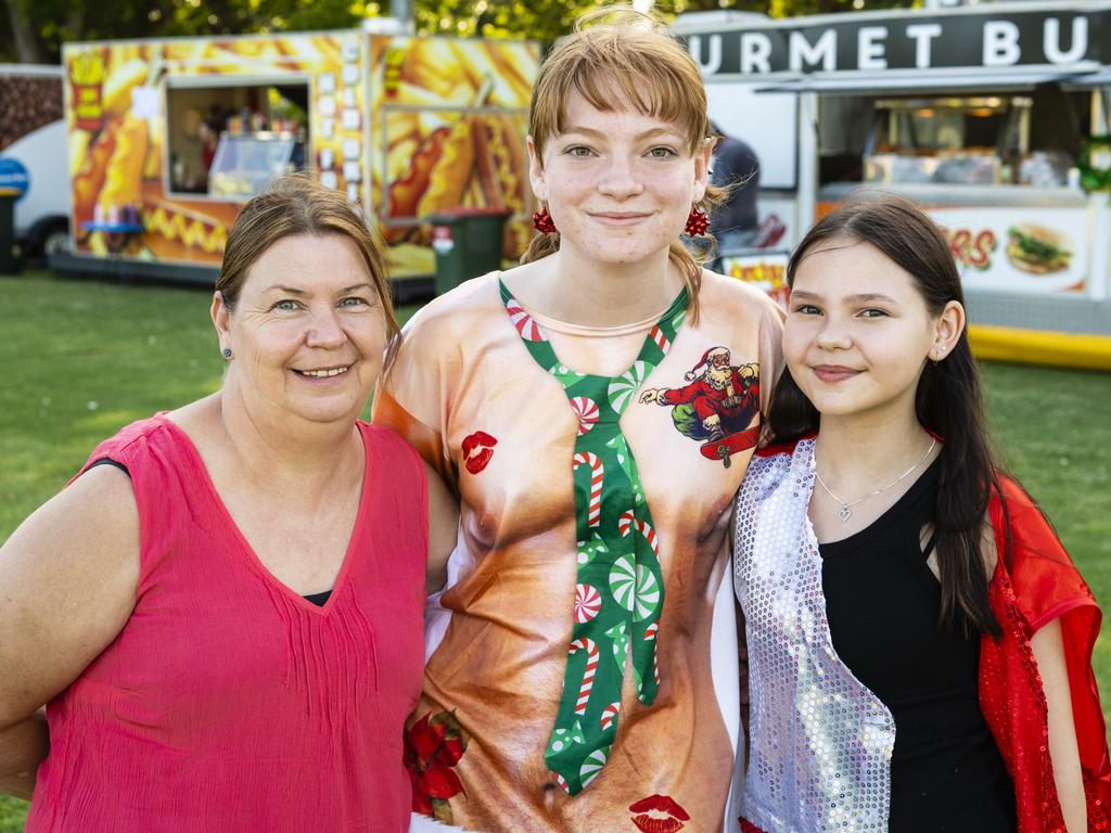 Ready to enjoy the carols are (from left) Bernadette Nemeth, Rachel Brooks and Jasmyne Nemeth at the Triple M Mayoral Carols by Candlelight, Sunday, December 11, 2022. Picture: Kevin Farmer