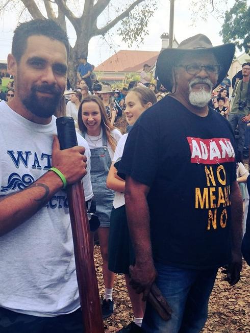 Aboringal activist Adrian Burragubba (right) and his so Coedie Mcavoy have been banned from stepping foot on Carmichael Mine land.