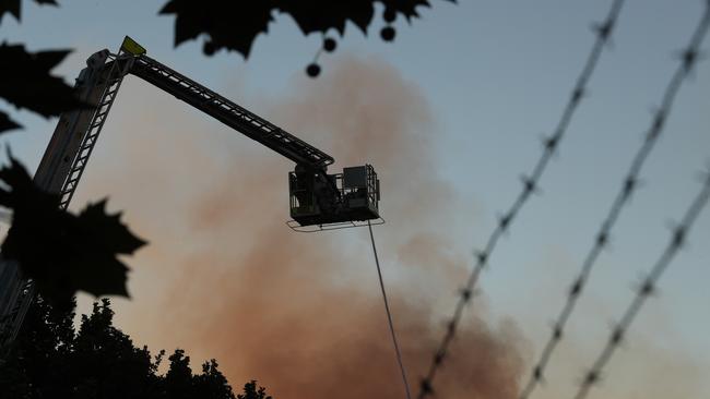 The fire began in the roof of the factory. Picture: John Grainger