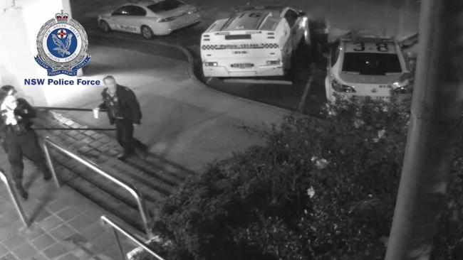 The officers have no idea a man is in the background. Picture: NSW Police