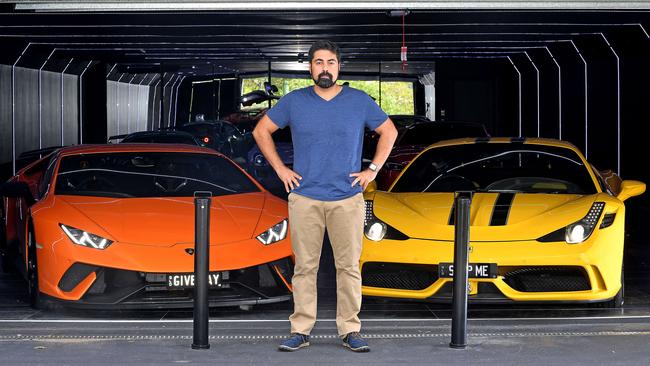 Alborz Fallah's with his car collection, now protected by steel bollards. Picture: John Gass