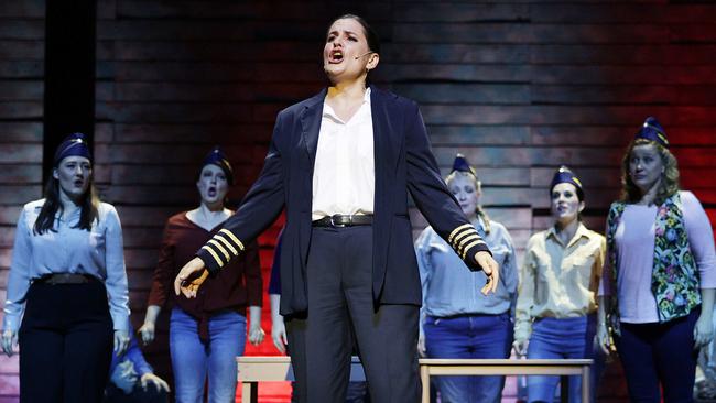 The Cairns Choral Society will perform the musical Come From Away at the Cairns Performing Arts Centre from January 10 to 18. Cairns Choral Society's Yasmine Croghan performs as an airline pilot in the musical Come From Away. Picture: Brendan Radke