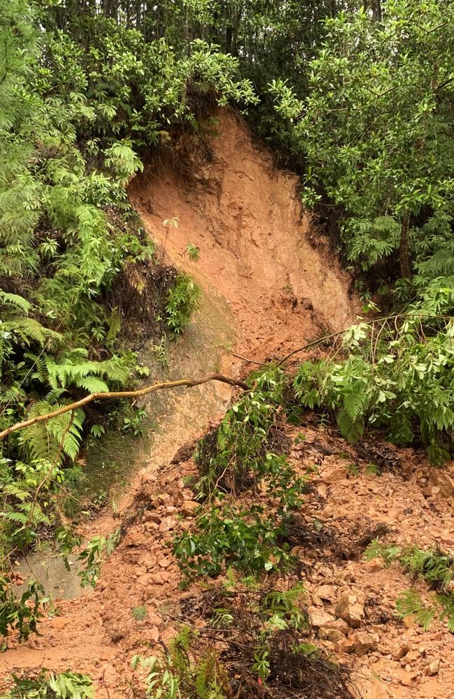 A small landslip on Currumbin Creek Road Currumbin Valley after torrential rain over night causing the creek to break its banks. NCA NewsWire / Scott Powick