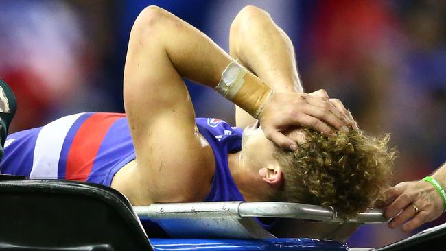 A shattered Mitch Wallis is taken from the ground after his sickening injury against the Saints. Picture: Getty Images