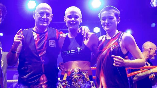 Sunshine Coast Muay Thai fighter Jorja Hersey with her coach Joe Hilton (left) and teammate Skylah Hamill. Picture: Scottya