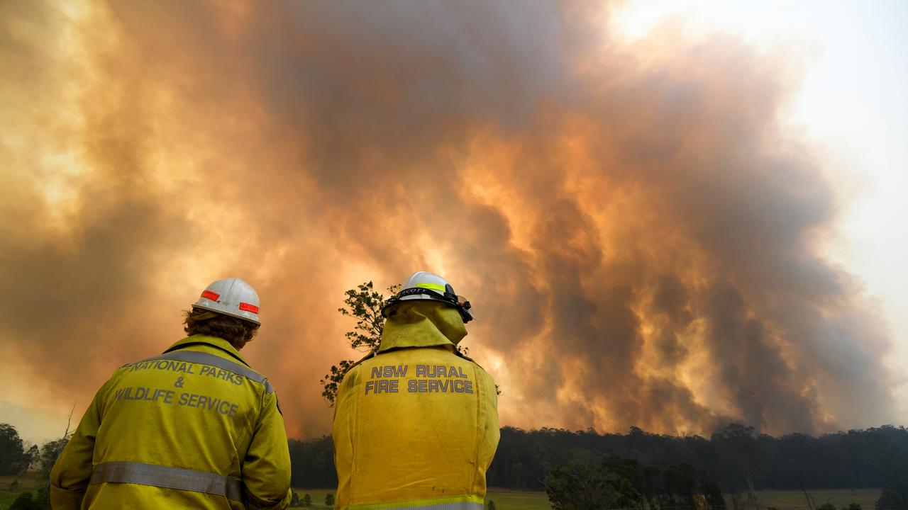 Smoke from a large bushfire is seen outside Nana Glen. Picture: AAP