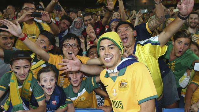 Massimo Luongo of Australia celebrates with the fans.