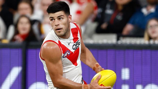 MELBOURNE, AUSTRALIA - APRIL 28: Lewis Melican of the Swans in action during the 2024 AFL Round 07 match between the Hawthorn Hawks and the Sydney Swans at the Melbourne Cricket Ground on April 28, 2024 in Melbourne, Australia. (Photo by Michael Willson/AFL Photos via Getty Images)