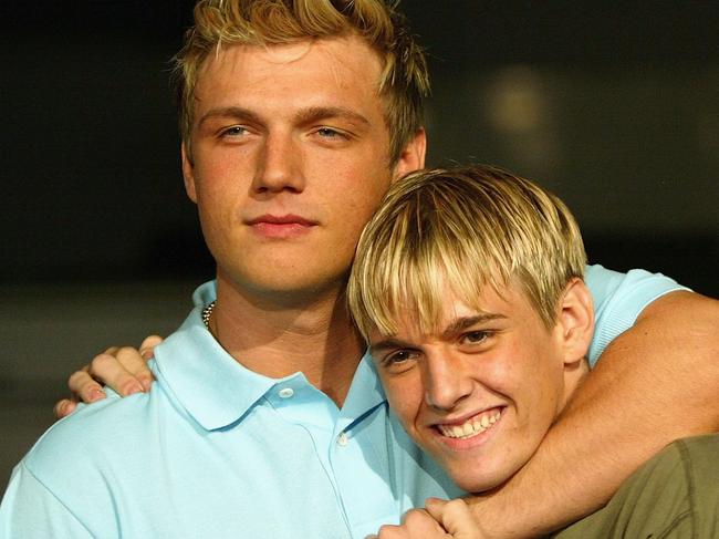 HOLLYWOOD, CA - APRIL 14:  Aaron and Nick Carter (L) aririve for the "Simple Life 2" Welcome Home Party at The Spider Club  on April 14, 2004 in Hollywood, California. (Photo by Frazer Harrison/Getty Images)