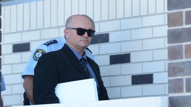 Senior Constable Michial Luke Greenhalgh, 39, leaves Lismore Local Court after the first four days of a hearing during which he has been defending a charge of common assault. The hearing will continue in the new year. Picture: Liana Boss