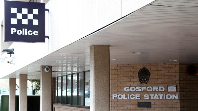 A man remains at Gosford Police Station after his arrest at East Gosford in the early hours of Friday. (AAP Image/Sue Graham)