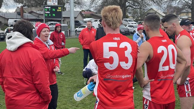 The Ballarat Swans huddle together during three quarter time in last year's final against Darley. Picture: Shane Jones.