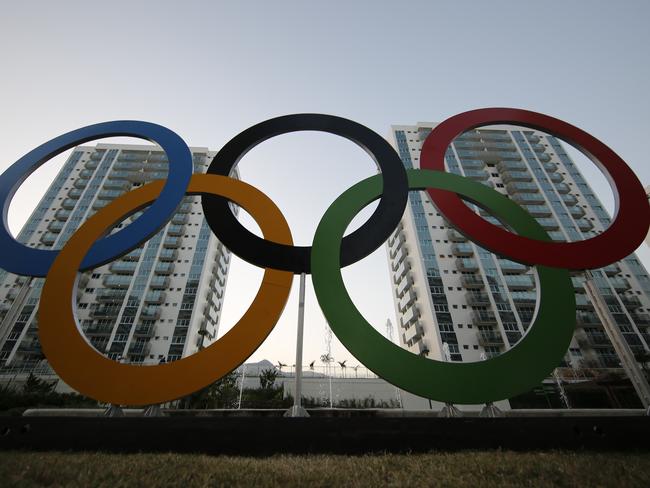 FILE - In this July 23, 2016, file photo, a representation of the Olympic rings are displayed in the Olympic Village in Rio de Janeiro, Brazil. The United States Olympic and Paralympic Committee took steps designed to help athletes in the wake of Olympic sex-abuse scandals, proposing an increase in their numbers on its board and recasting its mission statement to include the job of promoting their well-being. These changes are part of a proposal, released Monday, Aug. 19, 2019, to rewrite the USOPC bylaws. (AP Photo/Leo Correa, File)