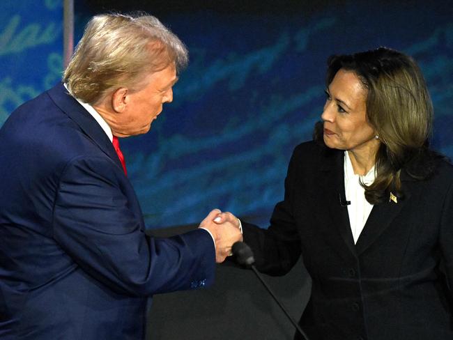 Donald Trump and Kamala Harris shake hands during the presidential debate. Picture: Saul Loeb