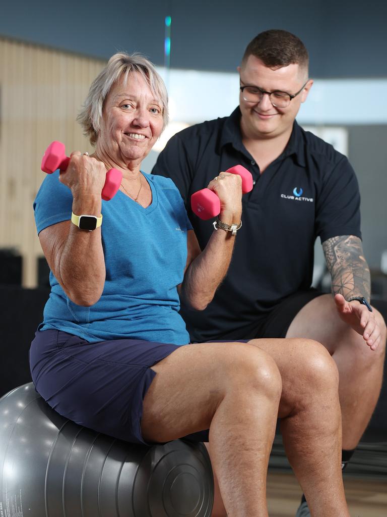 Judy Howard, 65, working with exercise physiologist Tom Stokes of Club Active Carindale. Picture: Liam Kidston