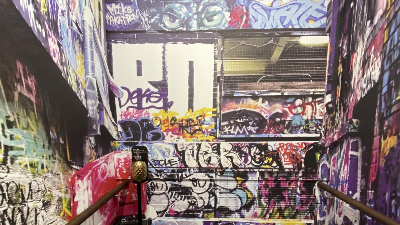 Each elevator is decorated with images of Melbourne's alleyways and street art. Picture: Grace McKinnon