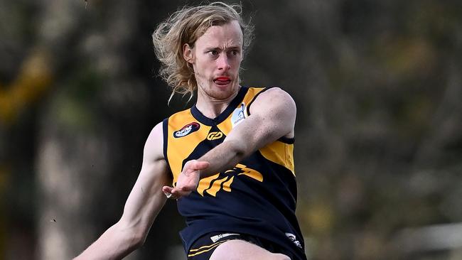 Mitchell Andrews in action for Whittlesea. Picture: Andy Brownbill