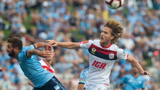 Adelaide United’s Ben Halloran challenges for the ball in the Reds’ A-League loss to Sydney FC. Picture: AAP Image/Steve Christo