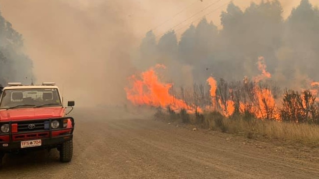 Members of the Southport Fire Brigade tackle a roadside flare-up. Reader’s picture