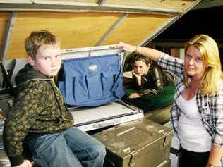 Mitchell and Trent Geiszler with mother Mara Haley. They are just one family hurt by the price of camping. . Picture: Gary Hutchison