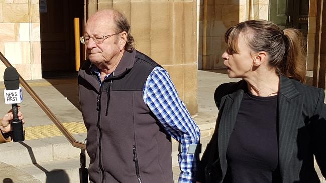 Mark Norman Hueppauff, left, outside the Adelaide Magistrates Court. Picture: Sean Fewster.