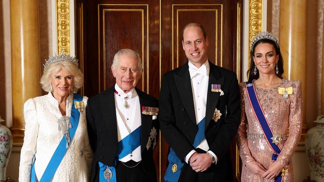 King Charles, Queen Camilla, Prince of Wales and Princess of Wales stand united at Buckingham Palace. Picture: AFP