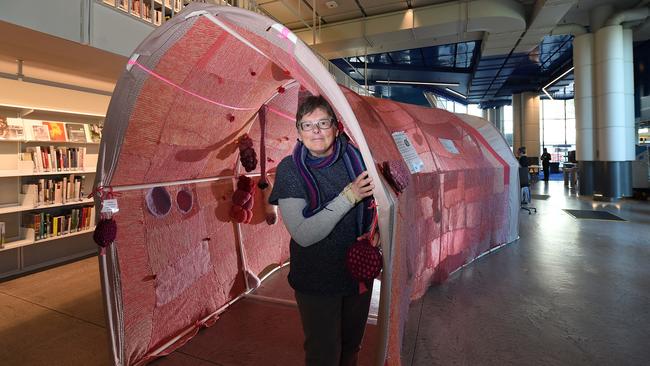 Claire Norman with the giant knitted bowel at Geelong Library. Picture: David Smith