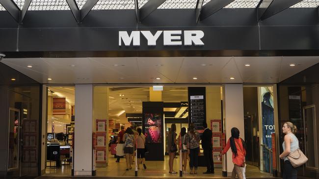 Melbourne, Australia - December 26, 2016: Three ladies enter the Myer store at Bourke Street Mall. The department store was open for Boxing Day sales.