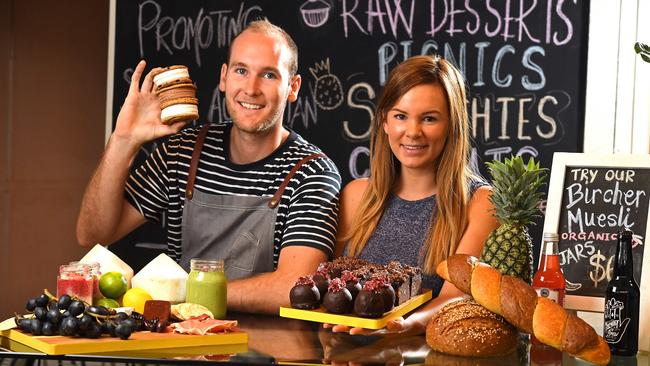 Owner of The Seller Door Tom Rodger with Jessie Cawte of Sweet Nectar raw desserts, which is stocked at the cafe. Pic: Tom Huntley