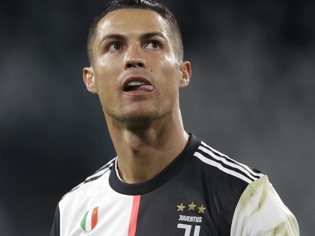 Juventus' Cristiano Ronaldo during an Italian Cup second leg soccer match between Juventus and AC Milan at the Allianz stadium, in Turin, Italy, Friday, June 12, 2020. The match was being played without spectators because of the coronavirus lockdown. (AP Photo/Luca Bruno)