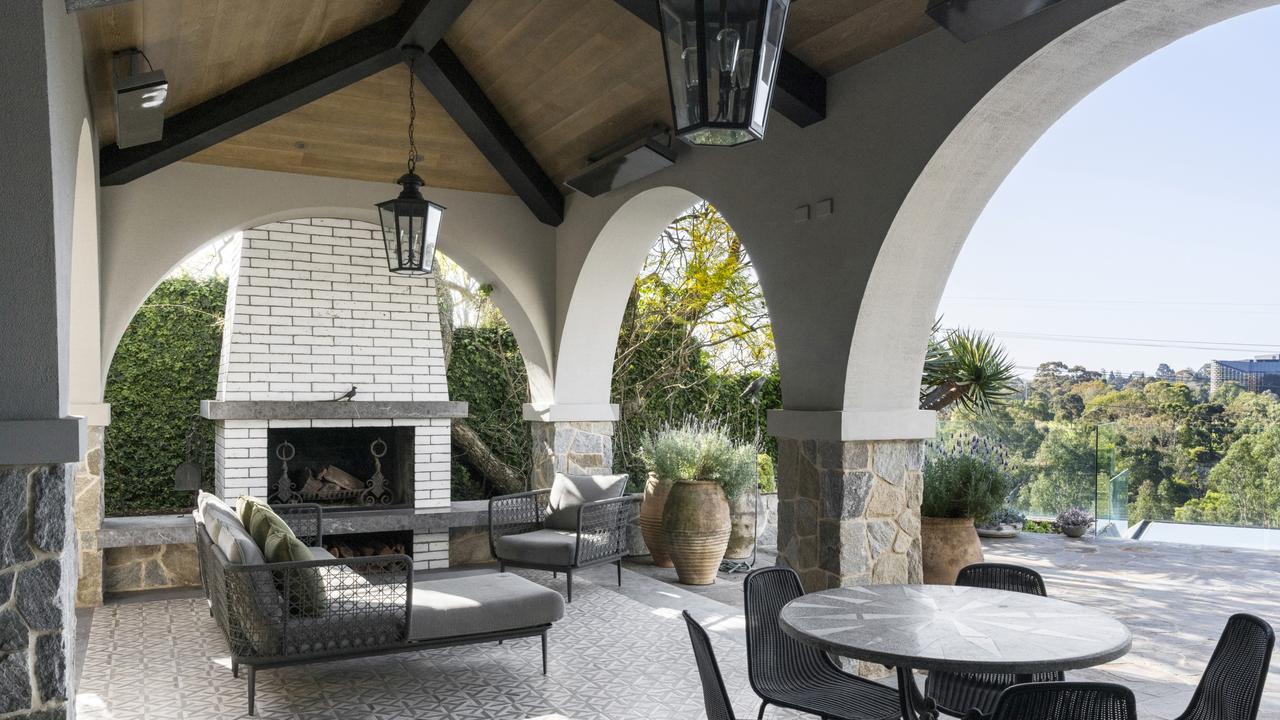 The outdoor entertaining area with fireplace.