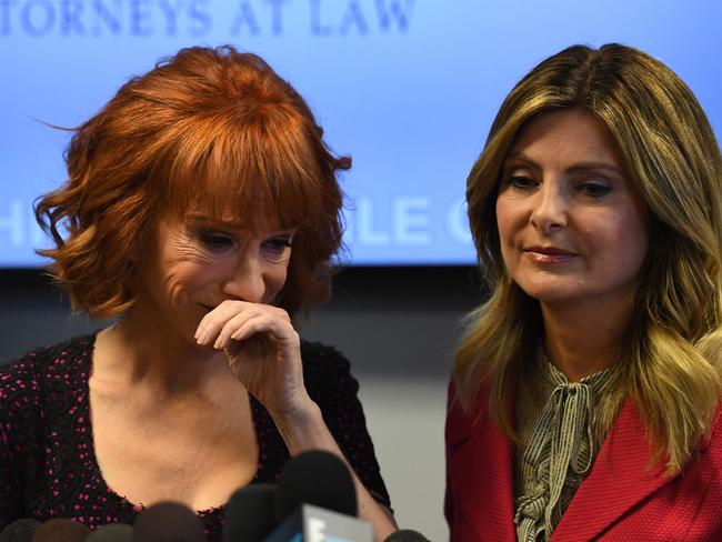 Comedian Kathy Griffin reacts during a news conference to discuss the comedian's "motivation" behind a photo of her holding what appeared to be a prop depicting US President Donald Trump's bloodied, severed head, with her lawyer, Lisa Bloom (R).  Picture:  AFP