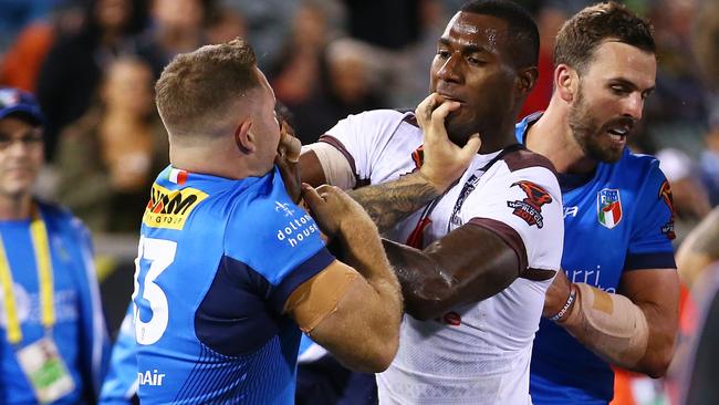 Nathan Brown and Suliasi Vunivalu tangle in Fiji’s win over Italy.